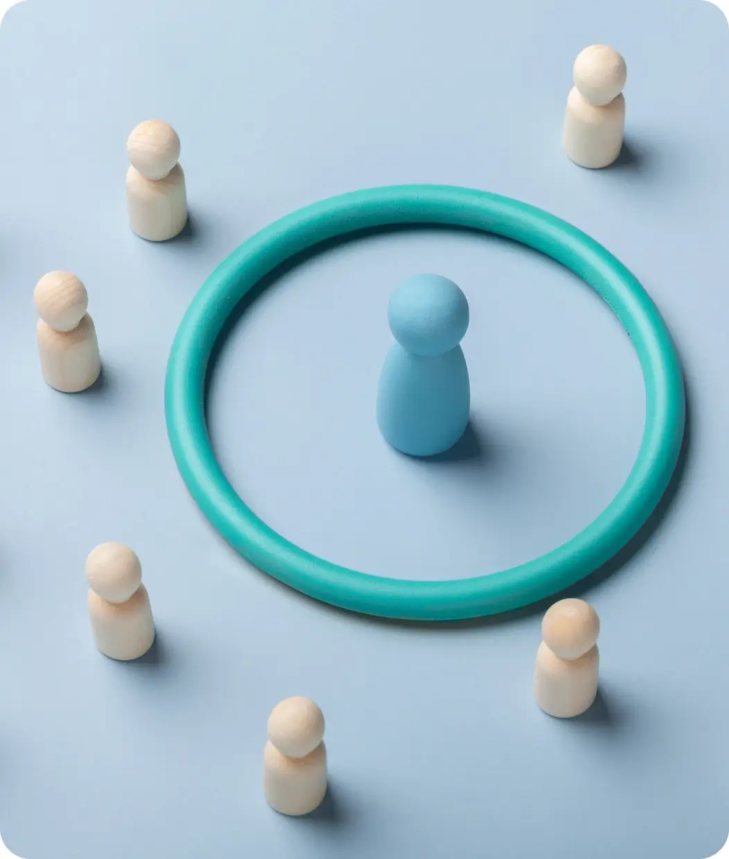 digital-marketing-walk blue figure inside a blue circle with white figures outside of it.