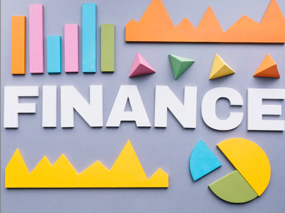 finance-industry-image letters spelling out finance with graphs and charts.
