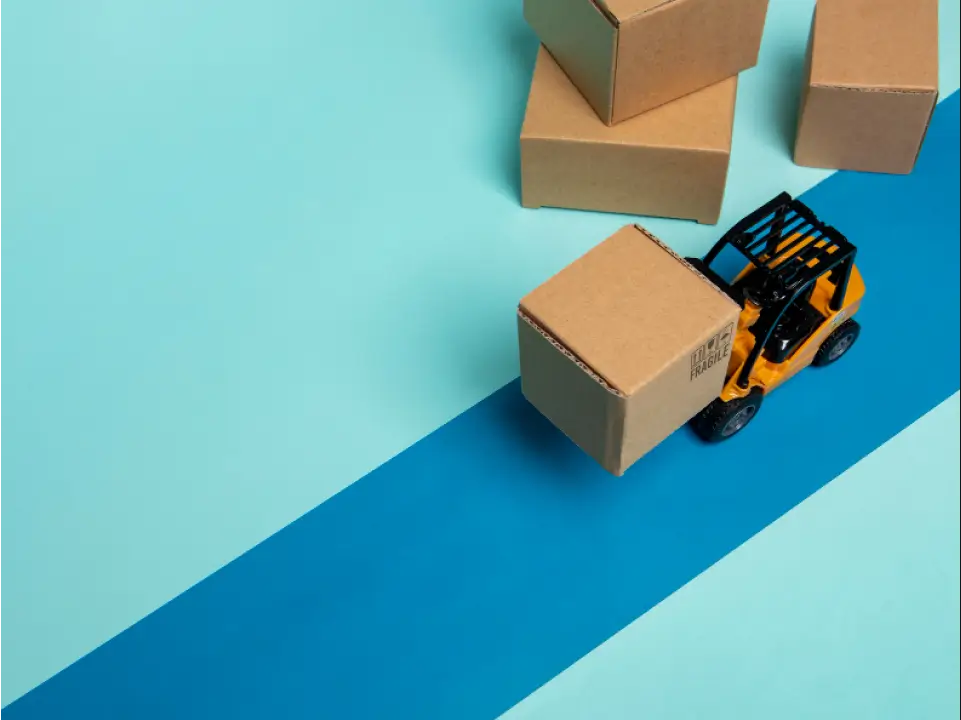 supply-chain-industry-image forklift picking up boxes in a supply chain.